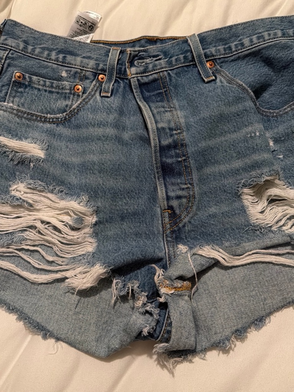 High-Rise Distressed Denim Cutoff Shorts - Light Blue